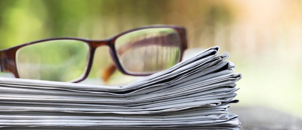 Morning news concept - newspaper and glasses